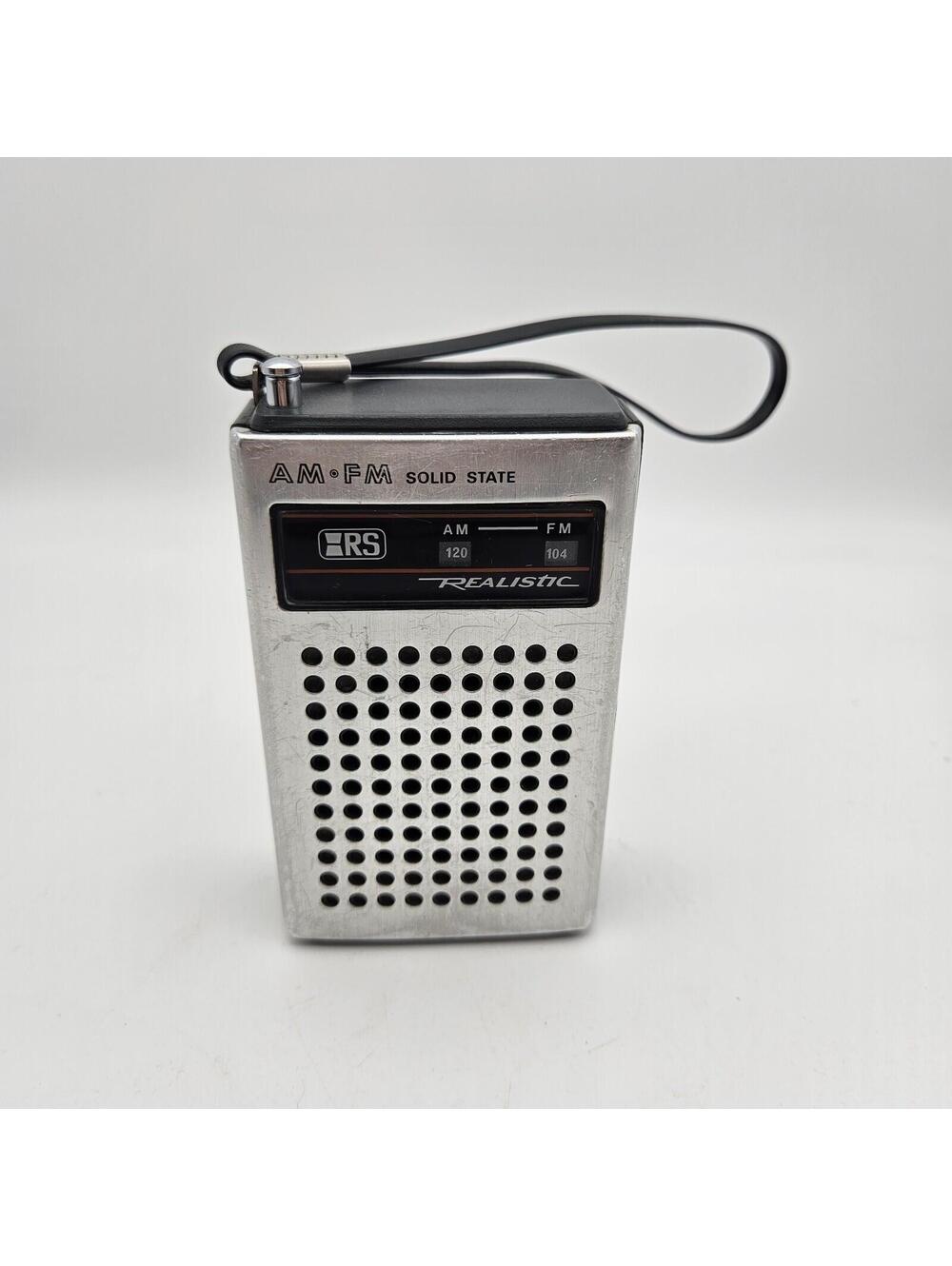 Vintage Realistic AM FM solid state portable transistor radio by Radio Shack